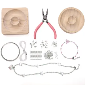 Kit de joyería DIY con bandejas de madera, alicates rosa, hilos y cierres langosta