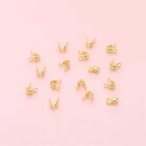14K gold filled clamshell bead tips for DIY jewelry making with smooth golden finish