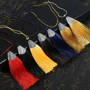 Traditional silk tassel pendants with silver metal caps in multiple vibrant colors