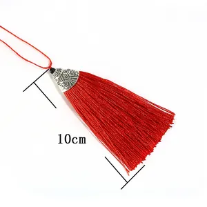 Handmade red tassel with engraved silver metal cap and hanging rope, 10cm length
