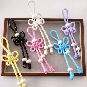 Colgantes de lazo en paracord hechos a mano con cuentas blancas para bolsos y llaves