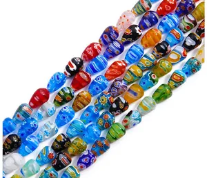 Macro shot of assorted teardrop millefiori glass beads for DIY jewelry making and crafts