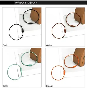 Detail of colorful coated steel wire keyrings with secure screw lock in four colors