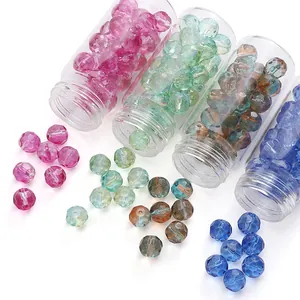 Cuentas de vidrio talladas de 10mm en frascos para creación de joyería artesanal