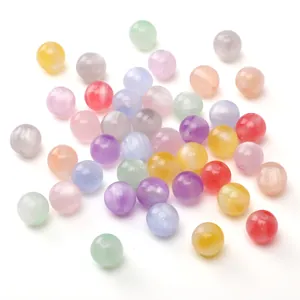 Mix of colorful resin star beads with cat eye shimmer for DIY jewelry making