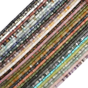 Macro shot of colorful cube stone beads arranged in rows for DIY jewelry making