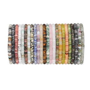 Detailed view of various natural stone disc bead bracelets in colorful assorted minerals