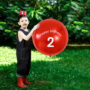 Detail of red 2nd birthday balloon with Happy Birthday print and matching crown headband