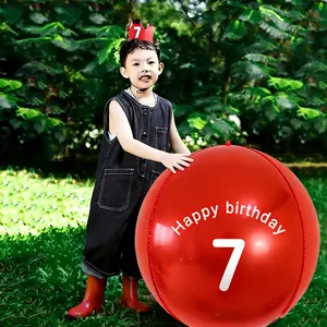 Detail of red 60-inch birthday balloon with white 7 print and matching party crown
