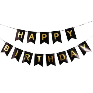 Black swallowtail banner with gold Happy Birthday lettering for party decoration