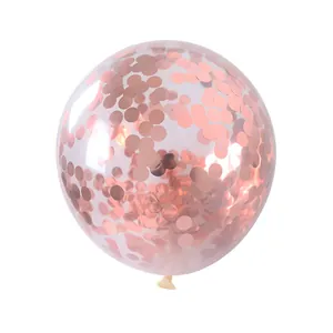 Detalle de globo transparente de 12 pulgadas con confeti redondo metálico de oro rosa