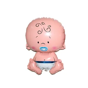 Détail d'un ballon bébé en aluminium avec corps rose et tétine bleue pour les fêtes