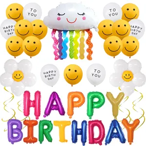 Smiley face birthday balloon set with happy birthday letters and white cloud decorations