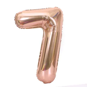 Detailed view of large rose gold 32-inch number 7 foil balloon for birthday parties