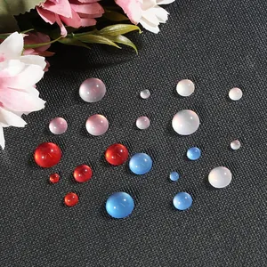Macro shot of colorful cat eye resin cabochons for DIY jewelry making in various sizes