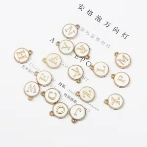 Pendentifs alphabet en émail blanc et bordure dorée pour création de bijoux DIY