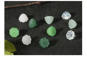 Macro detail of 10mm glass lotus seed pod beads for traditional DIY hair accessories