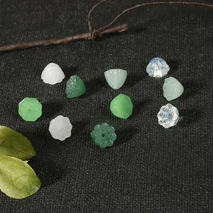 Macro detail of 10mm glass lotus seed pod beads for traditional DIY hair accessories