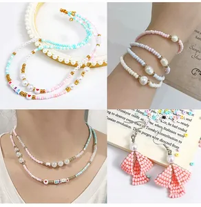 Detailed macro view of colorful DIY bead jewelry set with letter charms and heart beads