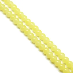 Double strand of polished yellow jade-style glass beads for DIY jewelry making crafts