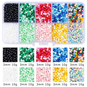 Detail view of 3mm 10g colorful glass seed beads in a 10-compartment storage box