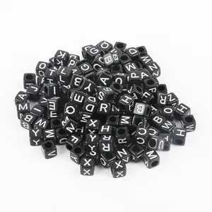 Square acrylic alphabet beads with white letters on black for DIY jewelry making kits
