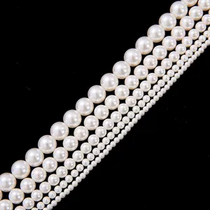 Polished white glass pearls in various sizes for DIY necklace and bracelet jewelry making