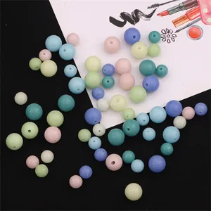 Mix of matte macaroon colorful round glass beads with holes for DIY jewelry making