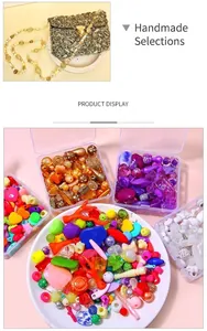 Macro shot of colorful acrylic beads assortment with heart and shell shapes in a clear box