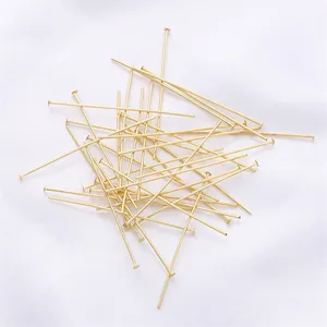 Macro view of 14K gold plated flat head pins for handmade jewelry DIY beading