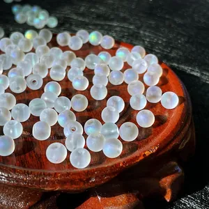 Macro view of frosted crystal beads with iridescent mermaid finish for DIY jewelry crafting