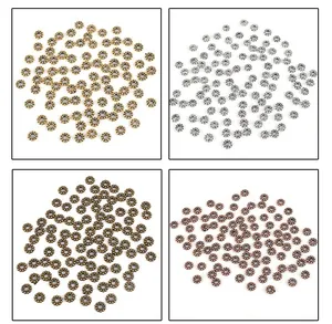 Macro detail of alloy sunflower spacer beads in gold, silver, bronze, and copper finishes