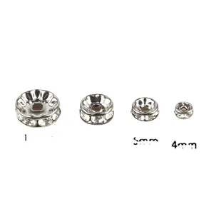 Perle distanziatrici rondelle argentate con cristalli bianchi in misure 4mm e 5mm