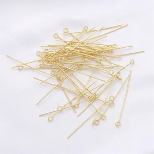 Macro shot of 14K gold plated eye pins for handmade jewelry DIY earring materials