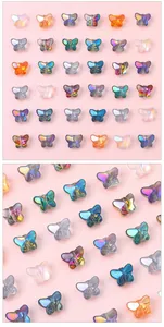 Macro detail of colorful butterfly glass beads for DIY jewelry making and craft supplies