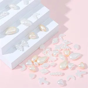 Assorted ivory ABS pearl beads in heart bow and drop shapes for DIY jewelry making