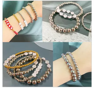 Detailed grid showing DIY beaded bracelets with metallic round beads and letter charms