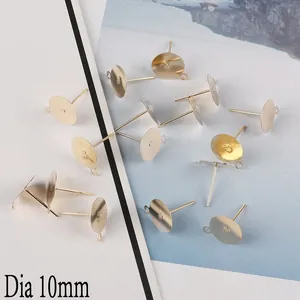Macro detail of 10mm gold-plated earring studs and tray base for DIY jewelry making