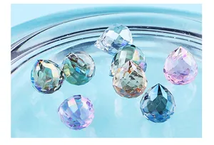 Macro view of multi-faceted colorful crystal glass teardrop beads for DIY jewelry making