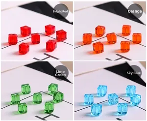 Macro detail of 6mm cube crystal glass beads in red, orange, green and blue for DIY jewelry