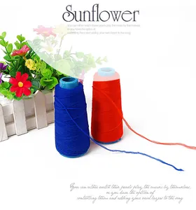 Close-up of red and dark blue high-elasticity sewing threads on spools for DIY bows