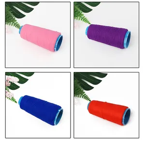 Detailed view of high-elasticity sewing thread in pink, purple, blue, and red spools