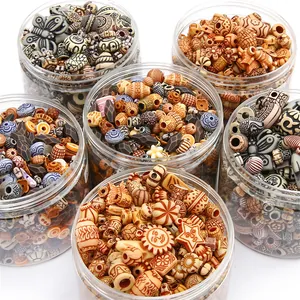Assorted vintage acrylic beads with ethnic patterns in clear jars for DIY jewelry making