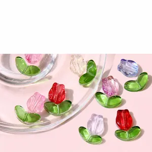 Detailed macro view of gradient pink tulip glass beads for DIY jewelry and accessories