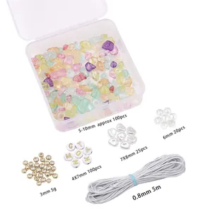 Bastelset für DIY-Schmuck mit bunten Glassteinen und goldenen Perlen für Handyketten