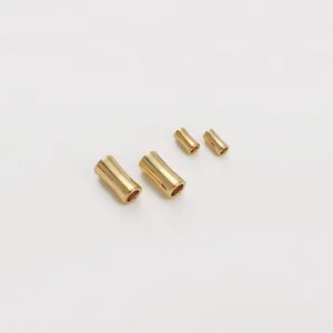 Makroaufnahme von 14K vergoldeten Perlen in Bambusform für die DIY Schmuckherstellung