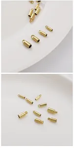 Detailed close-up of 14k gold plated cylindrical cord ends for DIY jewelry making