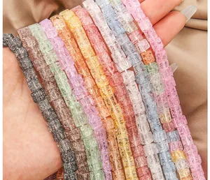Macro detail of 6mm square cracked glass beads in assorted candy colors for DIY jewelry