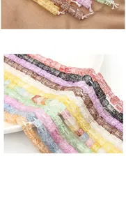 Macro view of 6mm candy-colored square crackle glass beads for DIY jewelry making