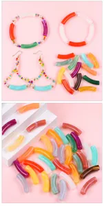 Macro detail of colorful acrylic curved tube beads with DIY handmade jewelry examples